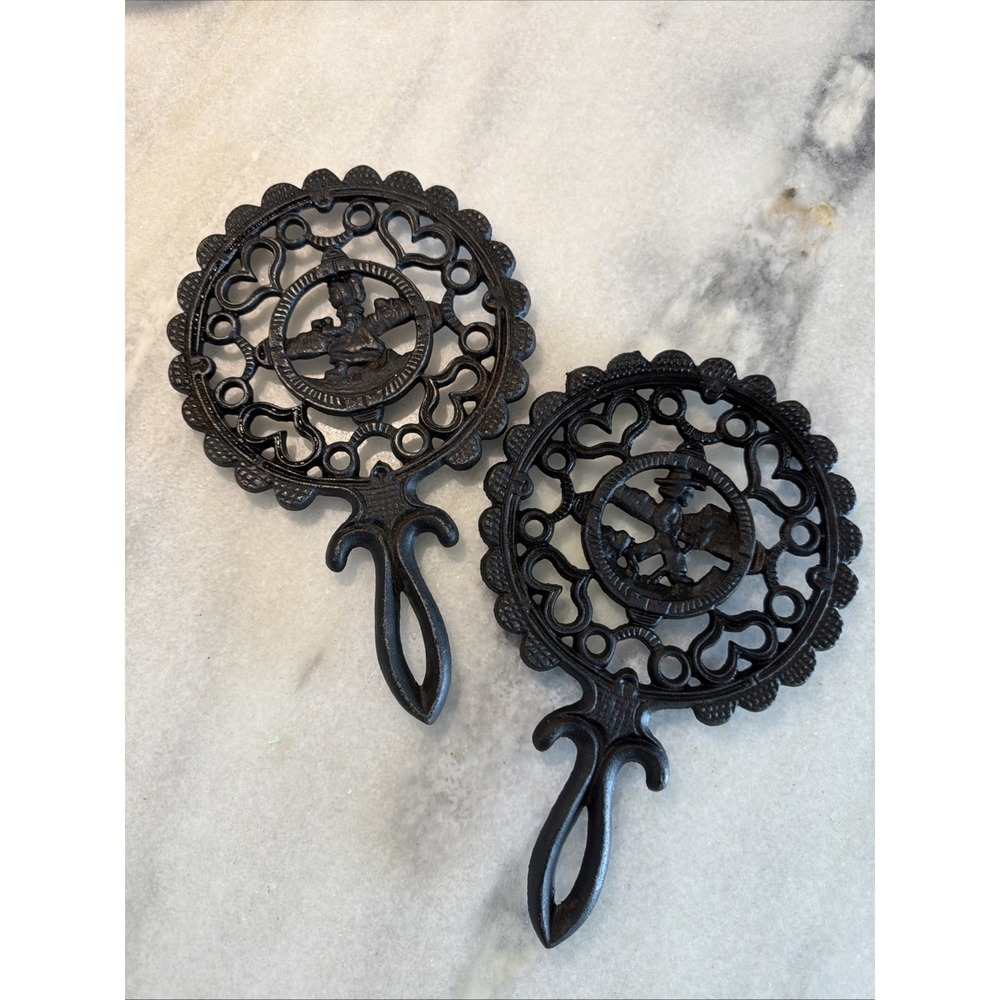 Set Of 2 Vintage Cast Iron Trivets Amish Boy And Girl OLA000